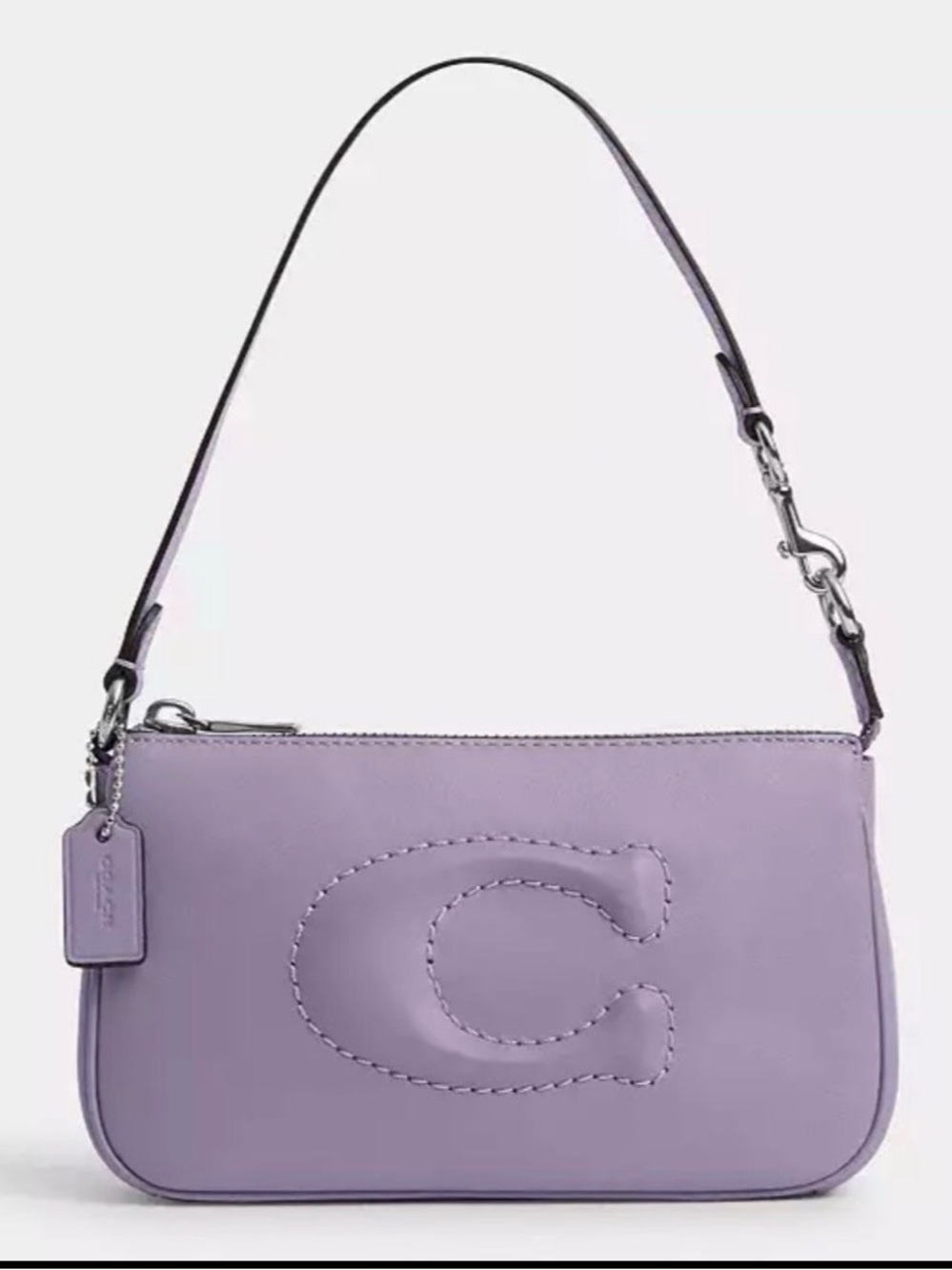 Coach Nolita 19 Bag /Wristlet in Light Violet leather with a puffy 'C' logo.